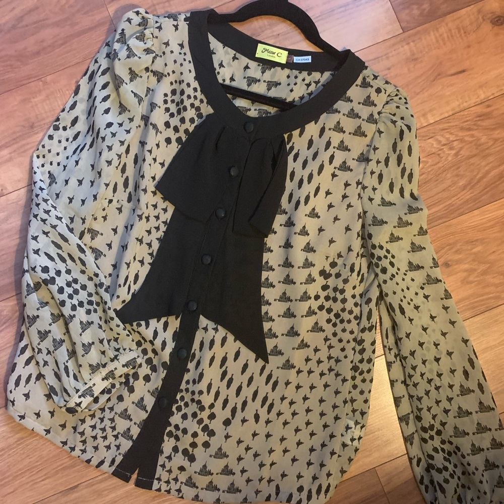 Black and beige patterned blouse, like new.